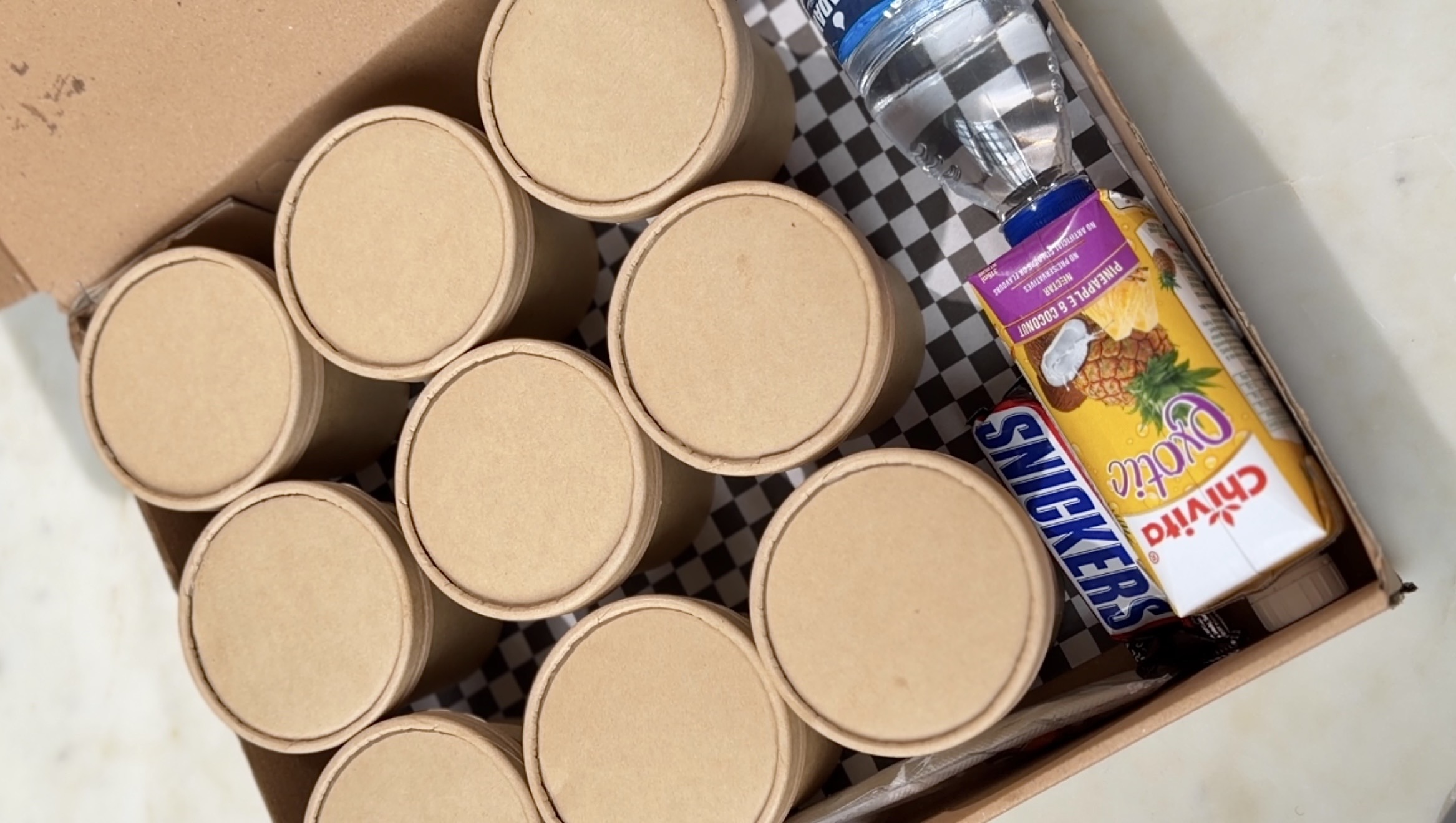 Delight Food Box with every cup lidded and ready to go
